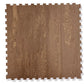 Tan interlocking foam gym tile with wood-grain texture and puzzle-piece edges, flat lay view