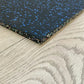 Warrior Multilayer Interlocking Rubber Gym Flooring Tile with black speckled surface and tan edge binding, displayed on light