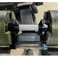 Adjustable dumbbell with olive green weight plates and black handle, displayed on stand showing 50lb/80lb configuration