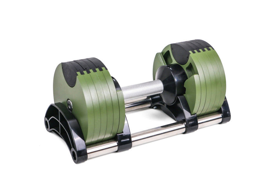 Adjustable dumbbell pair with green weight plates, black grip handles, and silver metal bar, on white background