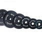 Warrior brand Olympic cast iron weight plates in graduating sizes from 45 lbs to 2.5 lbs, arranged in descending order on whi