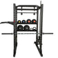 Black metal power rack with adjustable shelves holding various weights, kettlebells, and pull-up bar attachments on white bac