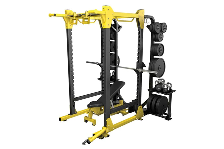 Warrior Pro Power Rack with yellow and black frame, black vertical uprights, weight plate storage pegs, and bar holders on wh