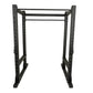 Black steel power rack with perforated uprights, adjustable cross bars, and foot plates on white background
