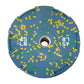 Warrior Fleck Easy-Grip 45 lb rubber bumper plate with yellow and green speckle pattern on blue background, top view
