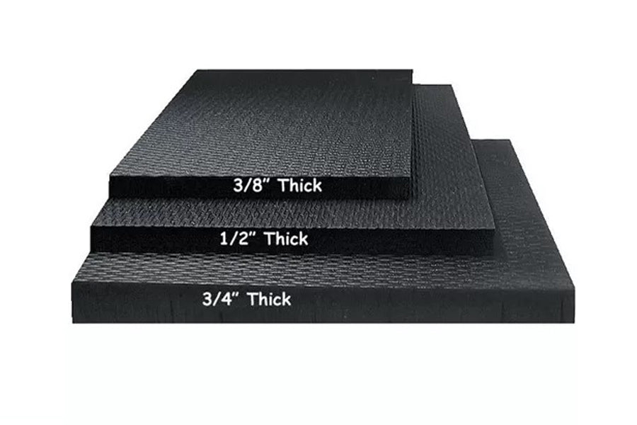 Black rubber gym floor mats in three thickness options: 3/8" thick, 1/2" thick, and 3/4" thick, stacked to show size comparis
