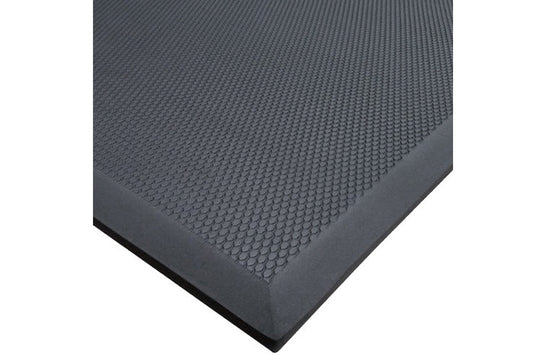 Charcoal gray rubber gym mat with textured dimple surface and beveled edges, flat lay view