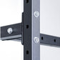 Black steel vertical storage rack with adjustable pegs and metal fasteners, close-up on white background