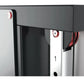 Warrior wall-mounted cable pulley system with black top frame, stainless steel column, and red accent details, shown from sid