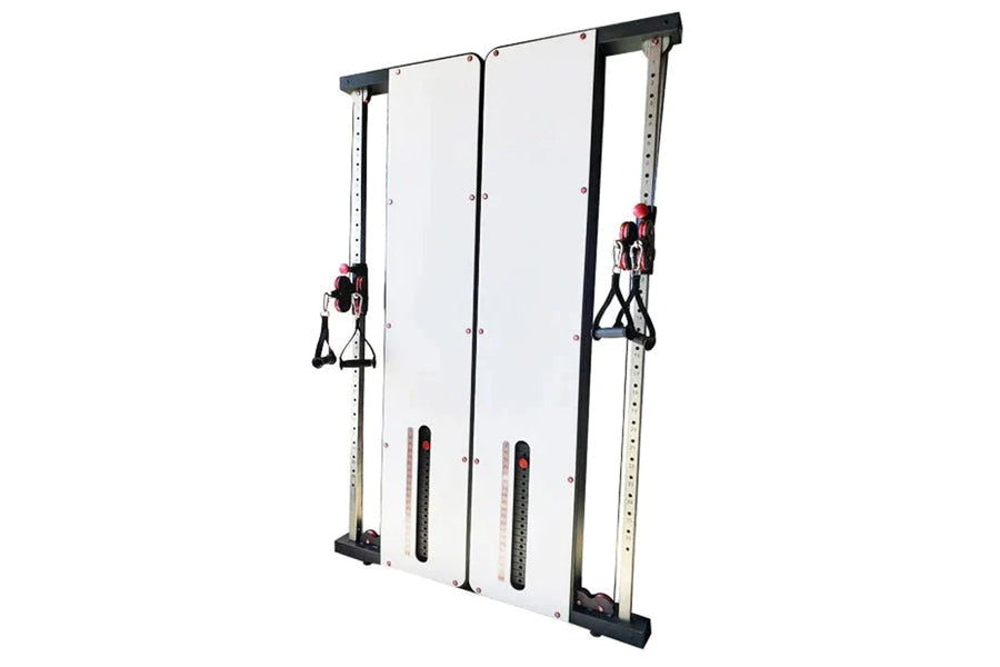 Warrior wall-mounted cable pulley home gym system with white panels, black frame, dual adjustable pulleys with red handles, a