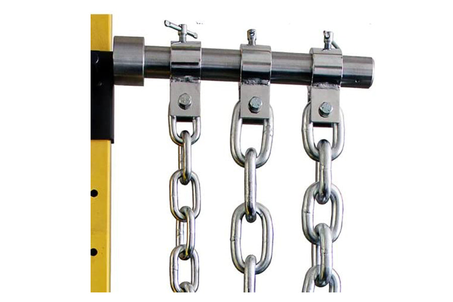 Steel weightlifting chains with metal links hanging from stainless steel bar and yellow support beam, flat lay view