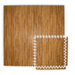 Wood grain interlocking foam floor tiles with white puzzle-piece edges in tan and brown tones, shown in flat lay arrangement