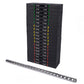 Stacked black rubber weight plates with color-coded bands ranging 20-200 lbs displayed with metal barbell on white background