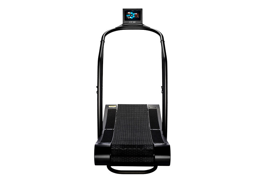 Black motorized treadmill with curved running deck, black handrails, and digital display monitor on top, front view on white 