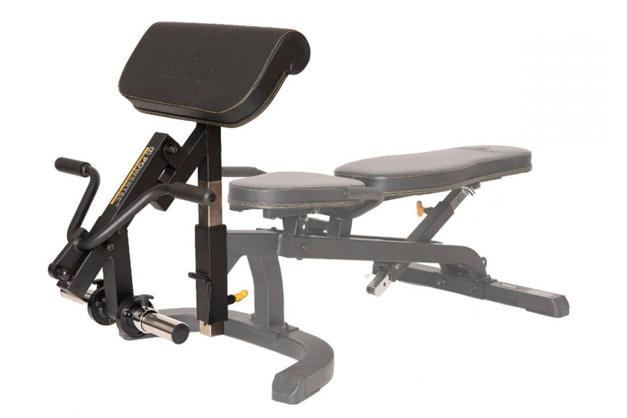 Black and gray leg curl machine attachment with padded seat and backrest, adjustable leg extension platform, and foot lever o