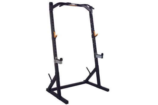 Black power rack with angled uprights, orange safety handles, and adjustable bar catches on white background
