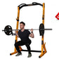 Yellow and black half rack with man performing barbell squat, loaded with black weight plates, on white background