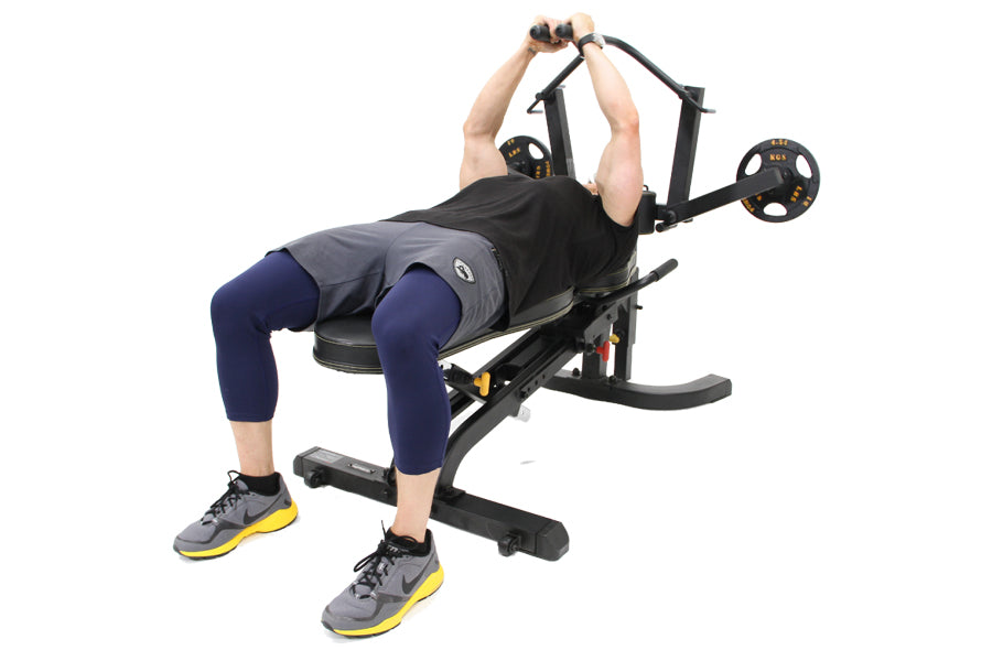 Person using black Powertec weight bench with pec fly attachment, wearing navy capris and gray-yellow sneakers, performing ch