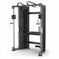 True XFT-900 functional trainer with black frame, dual weight stacks, cable attachments, and handlebar grips on white backgro