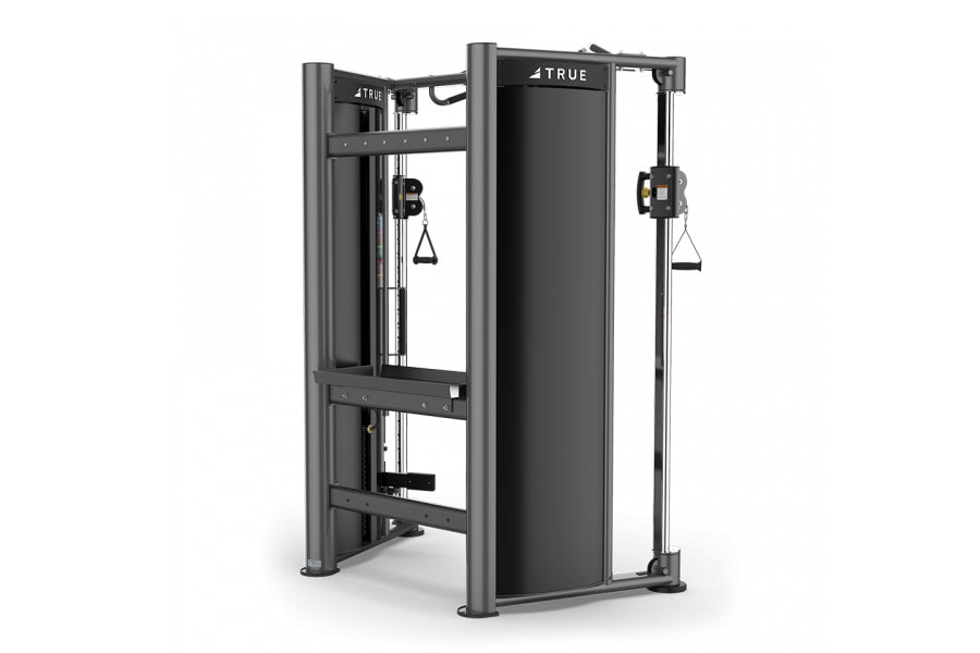 Black and gray TRUE XFT-900 functional trainer with dual cable stations and weight stack, displayed on white background