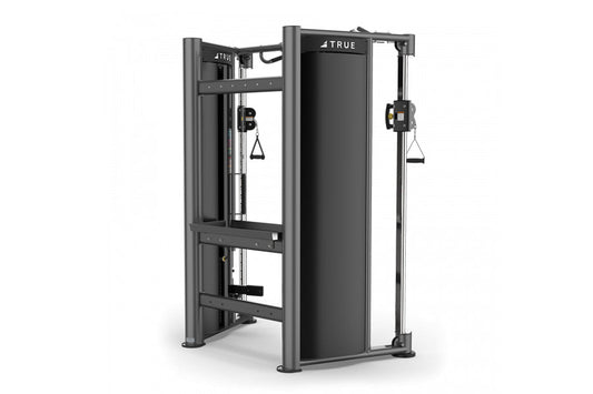 Black and gray TRUE XFT-900 functional trainer with dual cable stations and weight stack, displayed on white background