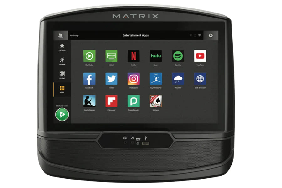 Matrix R50 recumbent exercise bike with black curved frame and touchscreen display showing entertainment apps