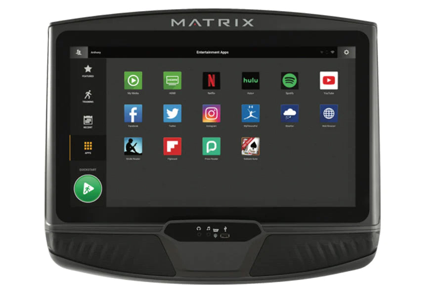 Matrix R50 recumbent exercise bike console displaying entertainment apps including Netflix, Hulu, and Spotify on black touchs
