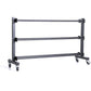 Xtreme Monkey 3 tier commercial medicine ball rack with black metal frame and rolling casters on white background