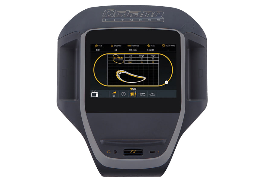 Octane ZR8000 commercial elliptical with dark gray frame and digital display showing workout metrics in yellow and black