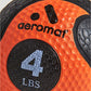 Aeromat bright orange medicine ball with textured surface, black accents, and 4 LBS weight marking in center panel