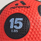 Aeromat 15 LBS red textured medicine ball with black weight label, close-up detail view