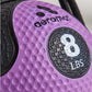 Purple textured medicine ball with black handles, featuring weight marking and Aeromat branding on dimpled surface