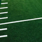Warrior Agility Turf artificial grass with white yard line markings and numbers on green field