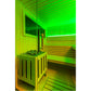 Almost Heaven Alpina outdoor sauna interior with bright green neon lighting, wooden bench seating, and stone heater with yell