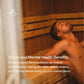 Man relaxing in wooden barrel sauna with horizontal benches and canopy top