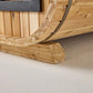 Wooden sauna base and curved metal band detail on white background, showing natural wood grain and construction