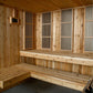 Natural wood indoor sauna interior with wooden benches, vertical slatted doors, and wooden walls and ceiling