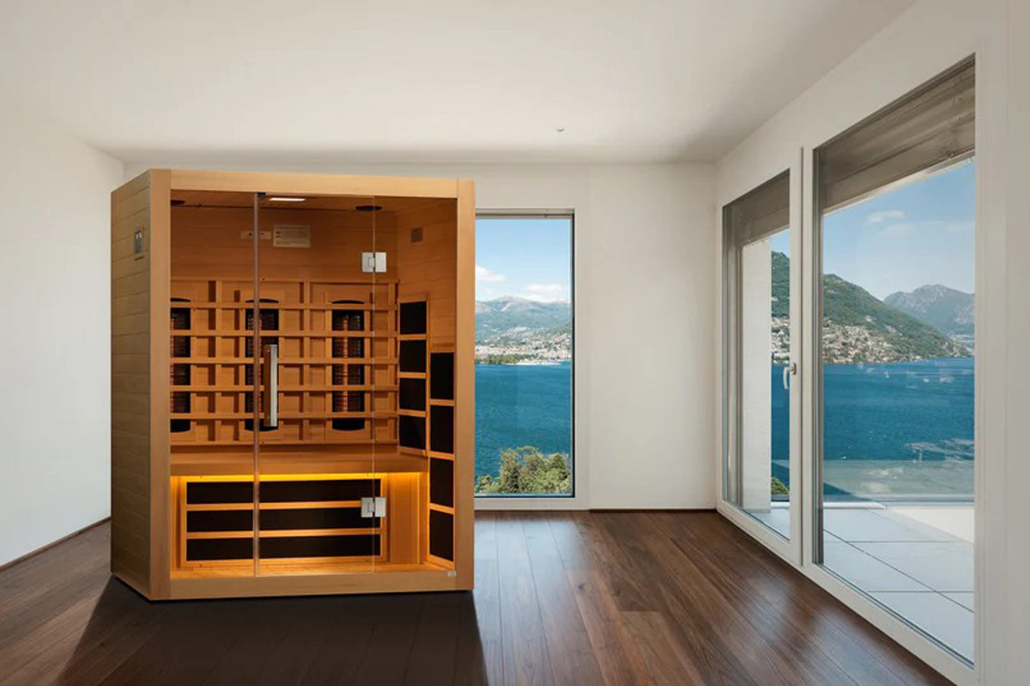 Almost Heaven Elysian 2-3 person infrared sauna with cedar wood exterior, glass doors, and illuminated interior benches in mo