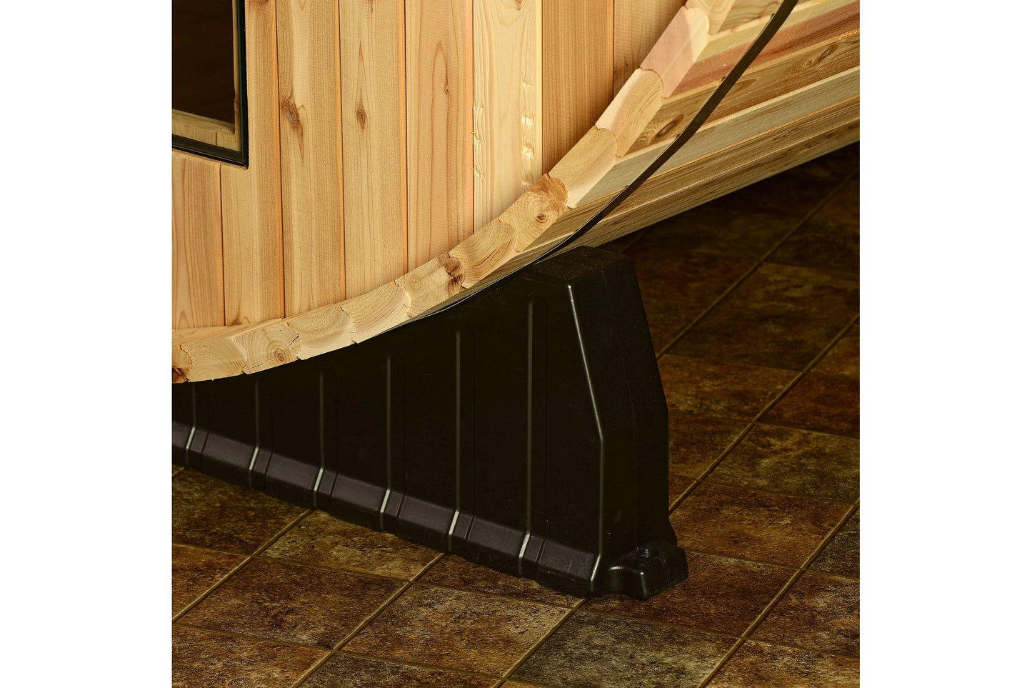 Almost Heaven Essex 4-person classic barrel sauna with light wood exterior and black metal base on tile floor