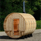 Barrel sauna made of light wood with horizontal planks, open wooden door visible, black metal chimney pipe extending from top