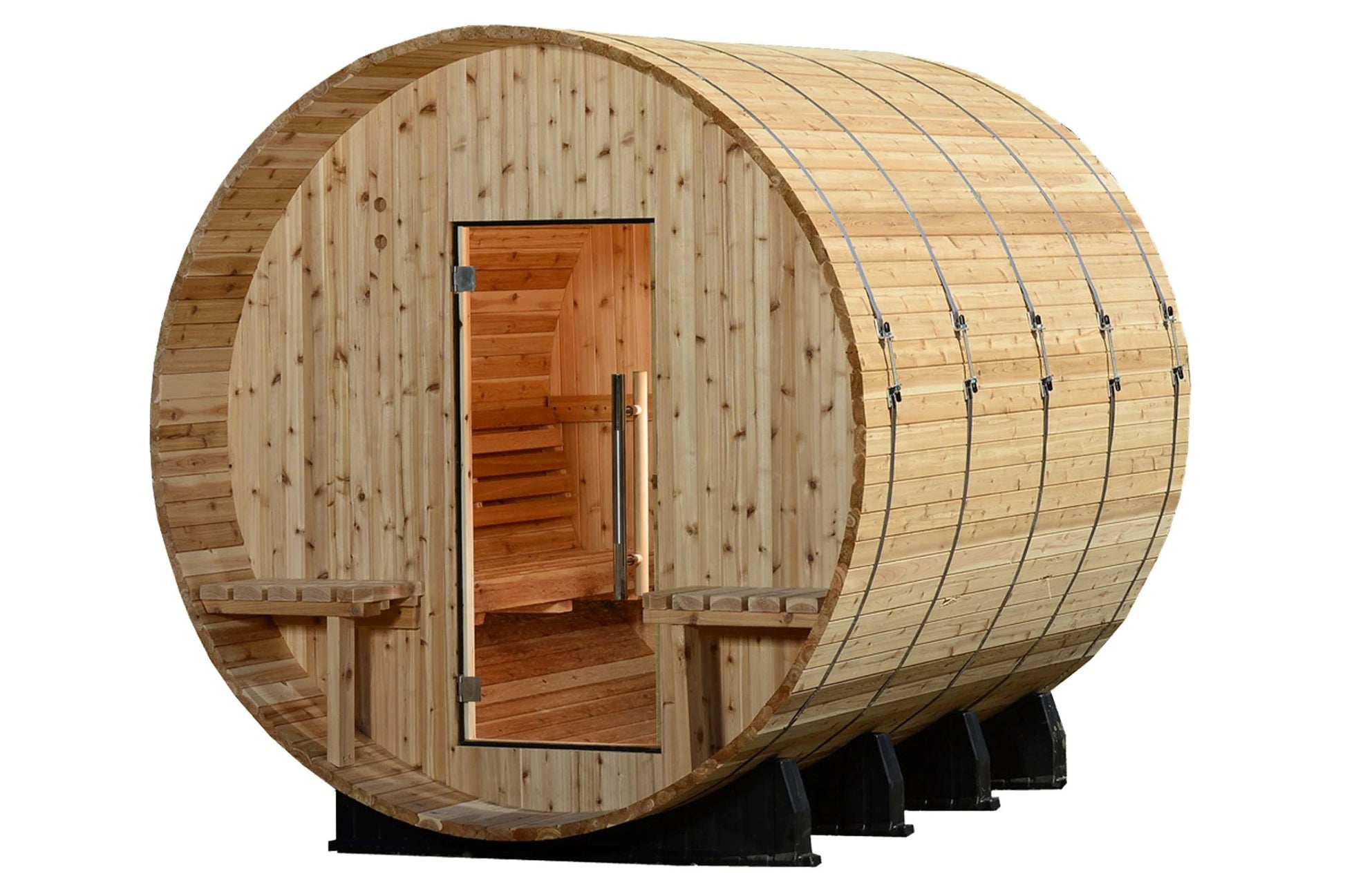 Cylindrical wooden barrel sauna with light pine exterior, open wooden door showing cedar interior, metal bands around curved 