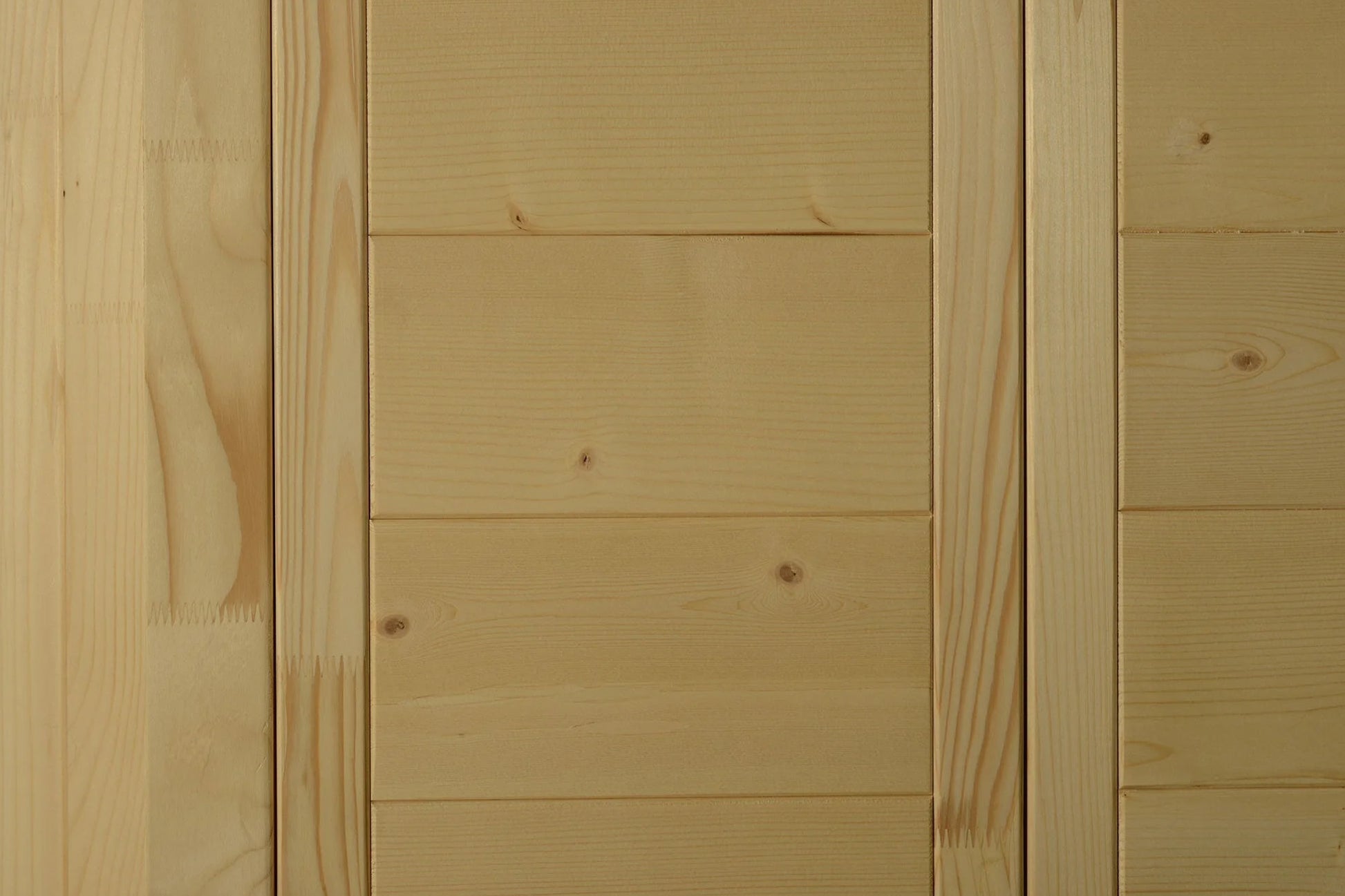 Light pine wood paneling with horizontal planks and natural knots, interior sauna wall detail