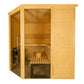 Natural pine wood indoor sauna with glass front door, wooden benches, and black heater stove on white background