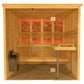 Golden wood sauna with glass doors, infrared heating panels glowing red, wooden benches, and black heater stove on white back