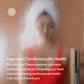 Person wearing white towel wrap in steaming sauna with red interior and chrome door handle visible