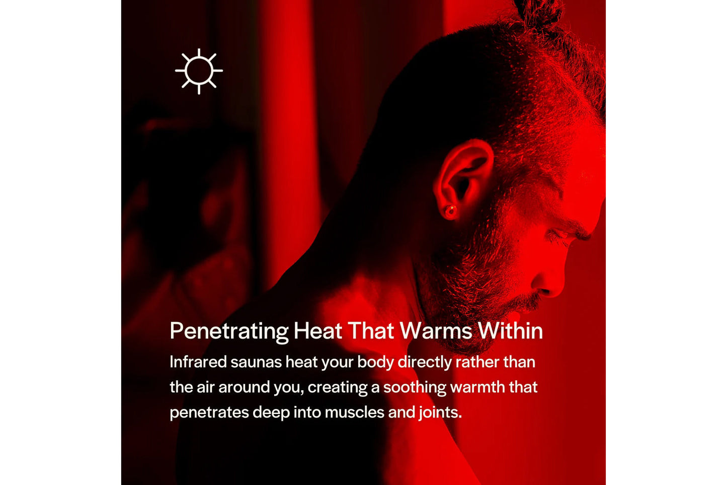 Man in profile bathed in red infrared light inside sauna, demonstrating deep penetrating heat technology