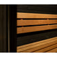 Wooden barrel sauna with horizontal pine slats and black metal frame, interior view showing stacked wood benches