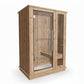 Natural cedar wood sauna cabin with glass door, interior wooden benches, and metal handle, front view on white background