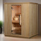 Light wood sauna with glass door, wooden benches, metal handle, and interior bucket, displayed on white background