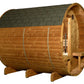 Wooden barrel sauna with dark grey shingle roof, cedar construction, open door with bench interior, and wooden support legs